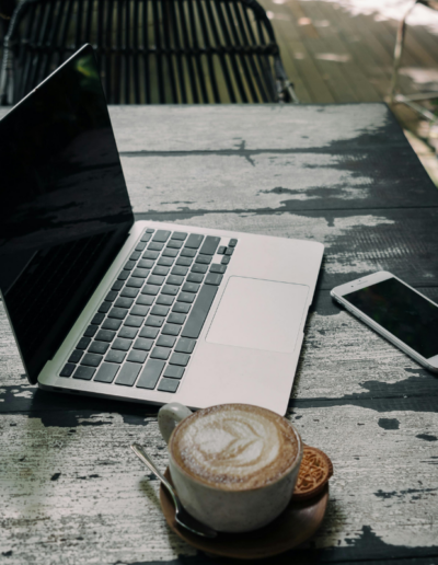 Behind-the-scenes image showing simplified, intentional work after adopting the Paid For Your Presence® approach.